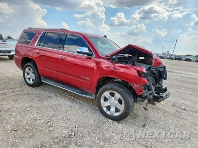 Czwarte zdjęcie samochodu z boku: 2015 CHEVROLET TAHOE C1500 LTZ VIN:1GNSCCKC8FR159823 - miniatura
