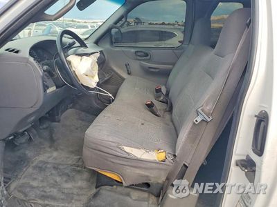 Zdjęcie 7 z 13 samochodu: 2001 FORD F150 VIN:2FTPX17Z01CA55319 - miniatura