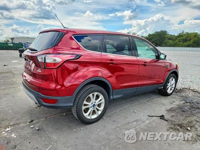 Trzecie zdjęcie samochodu z tyłu: 2017 FORD ESCAPE SE SE VIN:1FMCU0GD1HUB99599 - miniatura