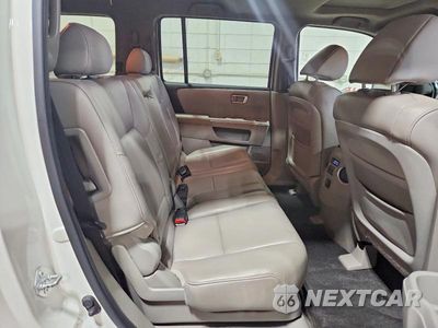 Zdjęcie 11 z 13 samochodu: 2011 HONDA PILOT EXL VIN:5FNYF4H56BB049961 - miniatura