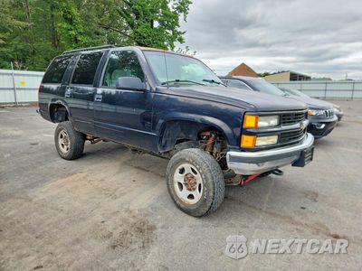 Czwarte zdjęcie samochodu z boku: 1999 CHEVROLET TAHOE K1500 VIN:1GNEK13R5XJ322595 - miniatura