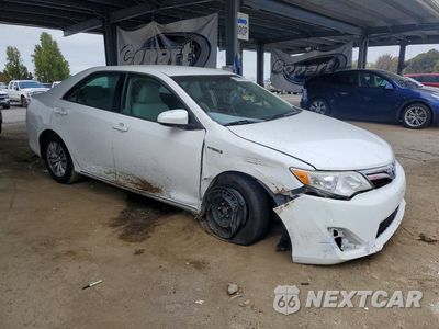 Czwarte zdjęcie samochodu z boku: 2014 TOYOTA CAMRY HYBRID LE VIN:4T1BD1FKXEU115650 - miniatura