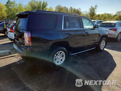Trzecie zdjęcie samochodu z tyłu: 2017 GMC YUKON SLE VIN:1GKS2AKC6HR322976 - miniatura