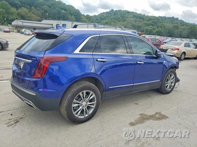 Trzecie zdjęcie samochodu z tyłu: 2023 CADILLAC XT5 PREMIUM LUXURY VIN:1GYKNDRS4PZ117277 - miniatura