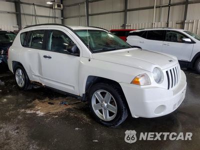 Czwarte zdjęcie samochodu z boku: 2010 JEEP COMPASS SPORT VIN:1J4NF4FB4AD506021 - miniatura