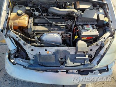 Zdjęcie 11 z 13 samochodu: 2004 FORD FOCUS SE COMFORT VIN:1FAFP34374W103212 - miniatura