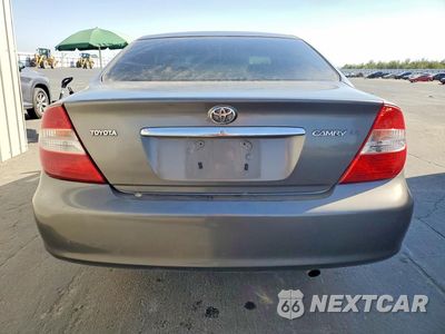 Zdjęcie 6 z 13 samochodu: 2002 TOYOTA CAMRY LE VIN:JTDBE32K820102661 - miniatura