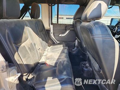 Zdjęcie 10 z 12 samochodu: 2014 JEEP WRANGLER UNLIMITED SAHARA VIN:1C4BJWEG0EL168161 - miniatura