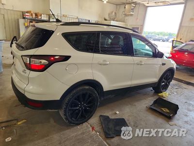 Trzecie zdjęcie samochodu z tyłu: 2018 FORD ESCAPE SE VIN:1FMCU0GD9JUA52274 - miniatura