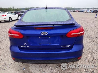 Zdjęcie 6 z 12 samochodu: 2015 FORD FOCUS TITANIUM VIN:1FADP3J27FL313316 - miniatura