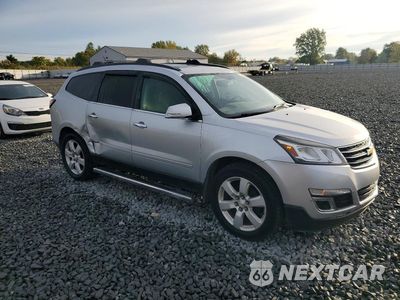 Czwarte zdjęcie samochodu z boku: 2016 CHEVROLET TRAVERSE LT VIN:1GNKRGKD0GJ301256 - miniatura