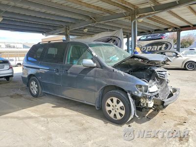 Czwarte zdjęcie samochodu z boku: 2004 HONDA ODYSSEY EXL VIN:5FNRL18794B121204 - miniatura