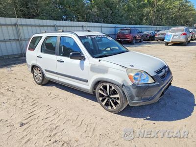 Czwarte zdjęcie samochodu z boku: 2004 HONDA CR-V LX VIN:JHLRD68594C014663 - miniatura