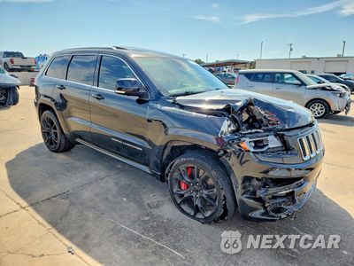 Czwarte zdjęcie samochodu z boku: 2014 JEEP GRAND CHEROKEE SRT-8 VIN:1C4RJFDJ9EC169577 - miniatura