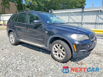 Czwarte zdjęcie samochodu z boku: 2011 BMW X5 XDRIVE35I VIN:5UXZV4C50BL404939 - miniatura