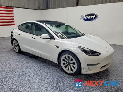 Czwarte zdjęcie samochodu z boku: 2022 TESLA MODEL 3 VIN:5YJ3E1EA2NF371126 - miniatura
