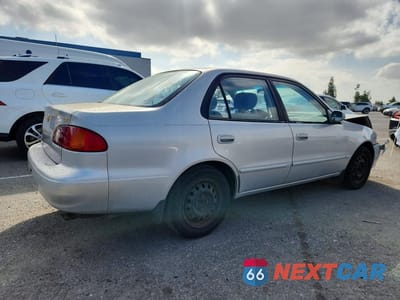 Trzecie zdjęcie samochodu z tyłu: 2001 TOYOTA COROLLA LE VIN:2T1BR12EX1C453434 - miniatura