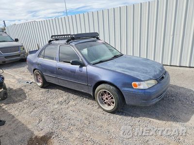 Czwarte zdjęcie samochodu z boku: 1999 TOYOTA COROLLA VE VIN:1NXBR12EXXZ266539 - miniatura