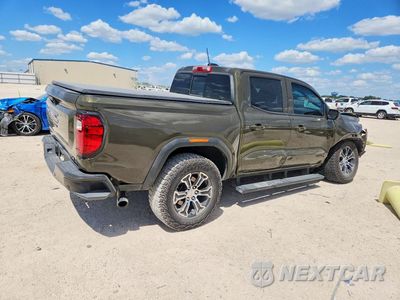 Trzecie zdjęcie samochodu z tyłu: 2024 GMC CANYON AT4 VIN:1GTP6DEK1R1296720 - miniatura