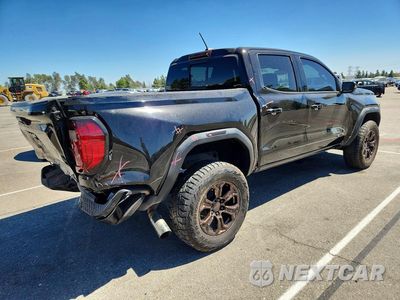 Trzecie zdjęcie samochodu z tyłu: 2023 GMC CANYON AT4 VIN:1GTP6DEK5P1194429 - miniatura