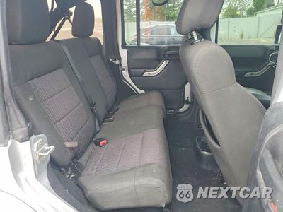 Zdjęcie 11 z 13 samochodu: 2011 JEEP WRANGLER UNLIMITED SAHARA VIN:1J4BA5H19BL572440 - miniatura