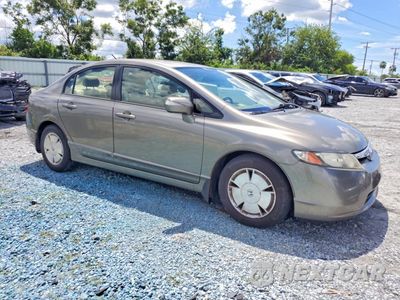 Czwarte zdjęcie samochodu z boku: 2006 HONDA CIVIC HYBRID VIN:JHMFA36276S028066 - miniatura