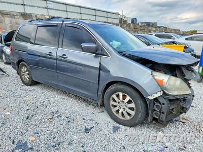 Czwarte zdjęcie samochodu z boku: 2010 HONDA ODYSSEY EXL VIN:5FNRL3H77AB040404 - miniatura