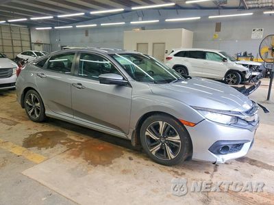 Czwarte zdjęcie samochodu z boku: 2016 HONDA CIVIC TOURING VIN:19XFC1F94GE001585 - miniatura