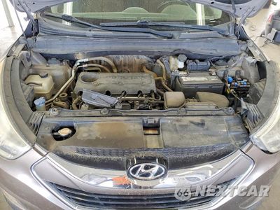 Zdjęcie 12 z 13 samochodu: 2011 HYUNDAI TUCSON LIMITED VIN:KM8JUCAC6BU312656 - miniatura