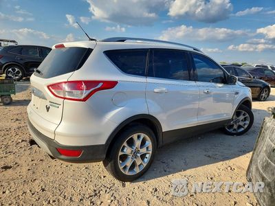 Trzecie zdjęcie samochodu z tyłu: 2016 FORD ESCAPE TITANIUM VIN:1FMCU0J9XGUB97367 - miniatura