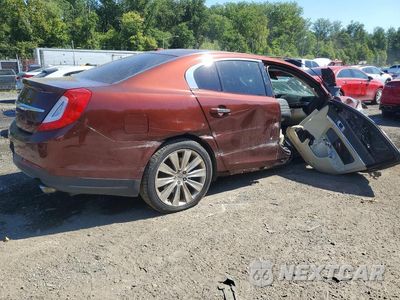 Trzecie zdjęcie samochodu z tyłu: 2015 LINCOLN MKS VIN:1LNHL9FT3FG600457 - miniatura