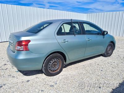 Trzecie zdjęcie samochodu z tyłu: 2010 TOYOTA YARIS BASE VIN:JTDBT4K39A4072856 - miniatura