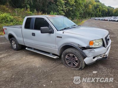 Czwarte zdjęcie samochodu z boku: 2005 FORD F150 VIN:1FTPX14585KB96934 - miniatura