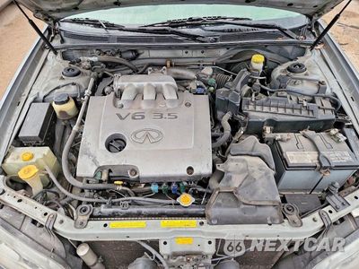 Zdjęcie 11 z 12 samochodu: 2003 INFINITI I35 BASE VIN:JNKDA31A83T114028 - miniatura