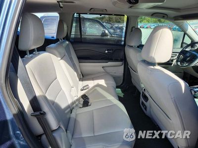 Zdjęcie 11 z 13 samochodu: 2020 HONDA PILOT TOURING VIN:5FNYF6H91LB015569 - miniatura