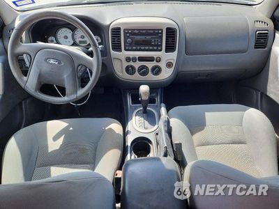 Zdjęcie 8 z 12 samochodu: 2006 FORD ESCAPE XLT VIN:1FMYU03136KB99436 - miniatura