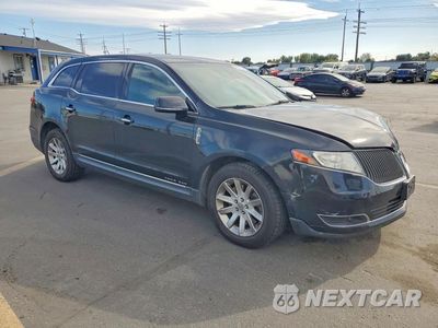 Czwarte zdjęcie samochodu z boku: 2015 LINCOLN MKT VIN:2LMHJ5NKXFBL03463 - miniatura