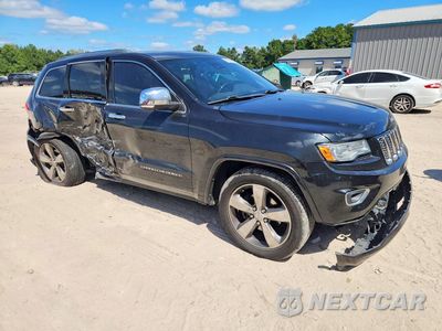 Czwarte zdjęcie samochodu z boku: 2016 JEEP GRAND CHEROKEE OVERLAND VIN:1C4RJECGXGC340095 - miniatura