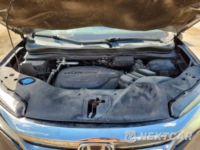 Zdjęcie 12 z 13 samochodu: 2019 HONDA PILOT ELITE VIN:5FNYF6H05KB072969 - miniatura