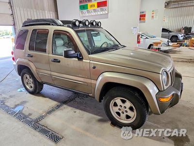 Czwarte zdjęcie samochodu z boku: 2004 JEEP LIBERTY LIMITED VIN:1J8GL58K34W195564 - miniatura