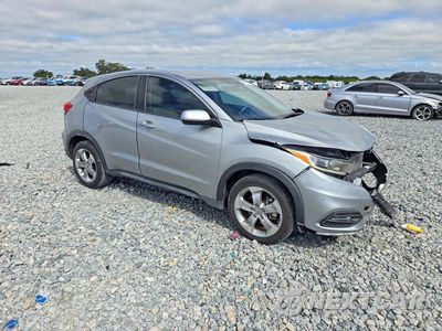 Czwarte zdjęcie samochodu z boku: 2020 HONDA HR-V LX VIN:3CZRU5H33LM712294 - miniatura