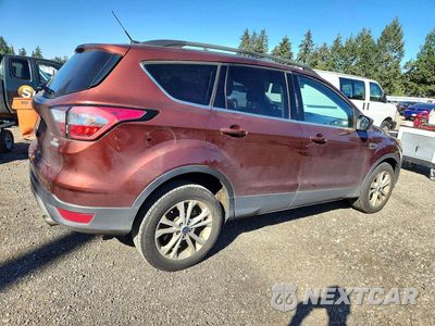 Trzecie zdjęcie samochodu z tyłu: 2018 FORD ESCAPE SE VIN:1FMCU0GD8JUB62331 - miniatura