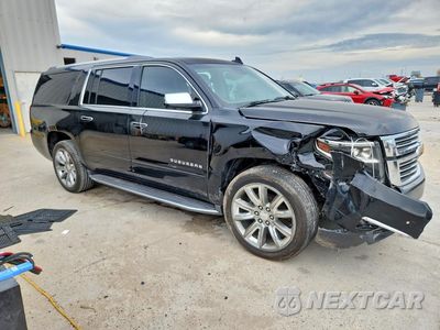 Czwarte zdjęcie samochodu z boku: 2017 CHEVROLET SUBURBAN C1500 PREMIER VIN:1GNSCJKC8HR275286 - miniatura