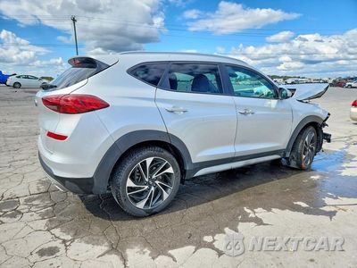 Trzecie zdjęcie samochodu z tyłu: 2019 HYUNDAI TUCSON SPORT VIN:KM8J33AL6KU061995 - miniatura