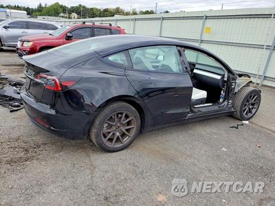 Trzecie zdjęcie samochodu z tyłu: 2023 TESLA MODEL 3 VIN:5YJ3E1EA1PF643488 - miniatura
