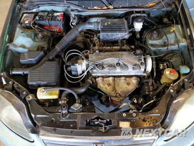Zdjęcie 11 z 12 samochodu: 2000 HONDA CIVIC BASE VIN:2HGEJ6613YH568208 - miniatura