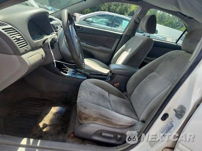 Zdjęcie 7 z 12 samochodu: 2003 TOYOTA CAMRY LE VIN:4T1BE32K23U254456 - miniatura