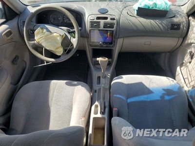 Zdjęcie 8 z 12 samochodu: 2001 TOYOTA COROLLA CE VIN:2T1BR12E21C453878 - miniatura