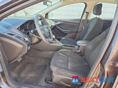 Zdjęcie 7 z 12 samochodu: 2018 FORD FOCUS SEL VIN:1FADP3M21JL303997 - miniatura