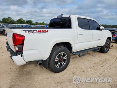 Trzecie zdjęcie samochodu z tyłu: 2019 TOYOTA TACOMA TRD SPORT VIN:3TMCZ5AN2KM207998 - miniatura